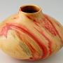 This extraordinary piece of flame Box Elder has more red than usual. The red coloring in natural...no dyes were used on this piece. It's about 6" wide by 5" tall and surprisingly lightweight.